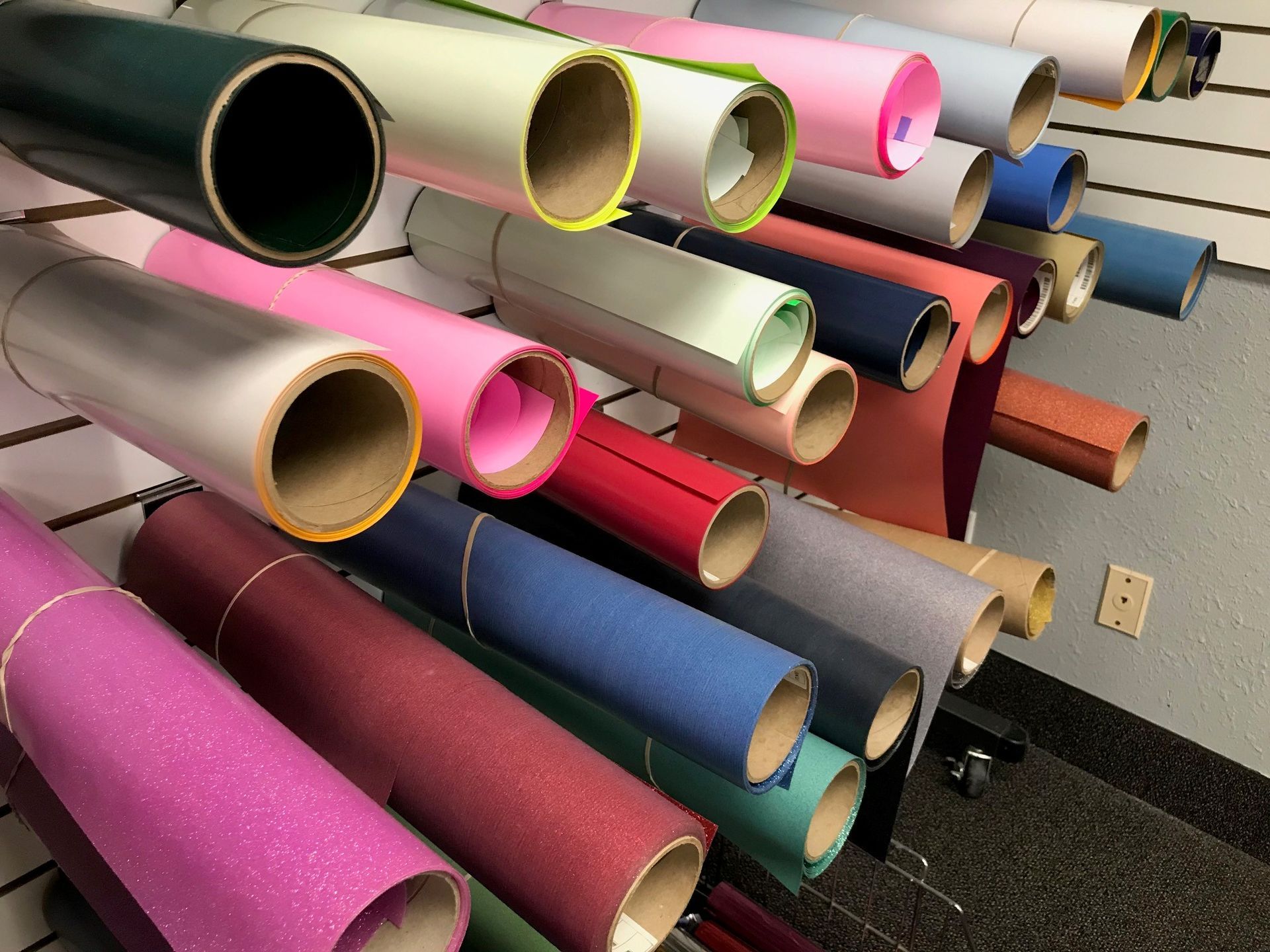 A bunch of rolls of paper are stacked on top of each other