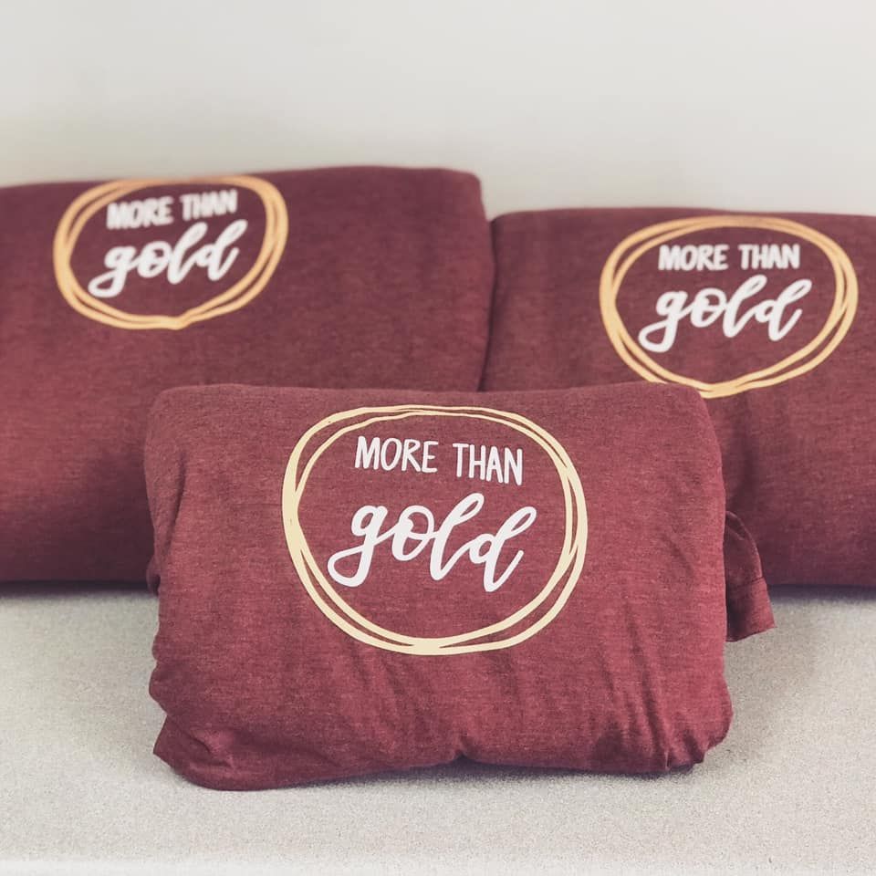 Three shirts that say more than gold on them