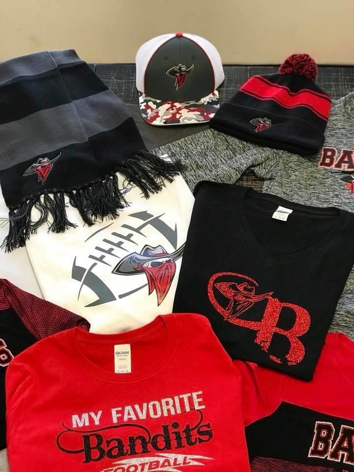 A bunch of clothes with one that says my favorite bandits