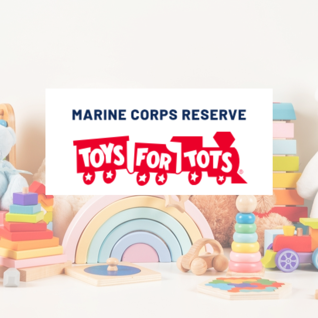 A sign that says marine corps reserve toys for tots