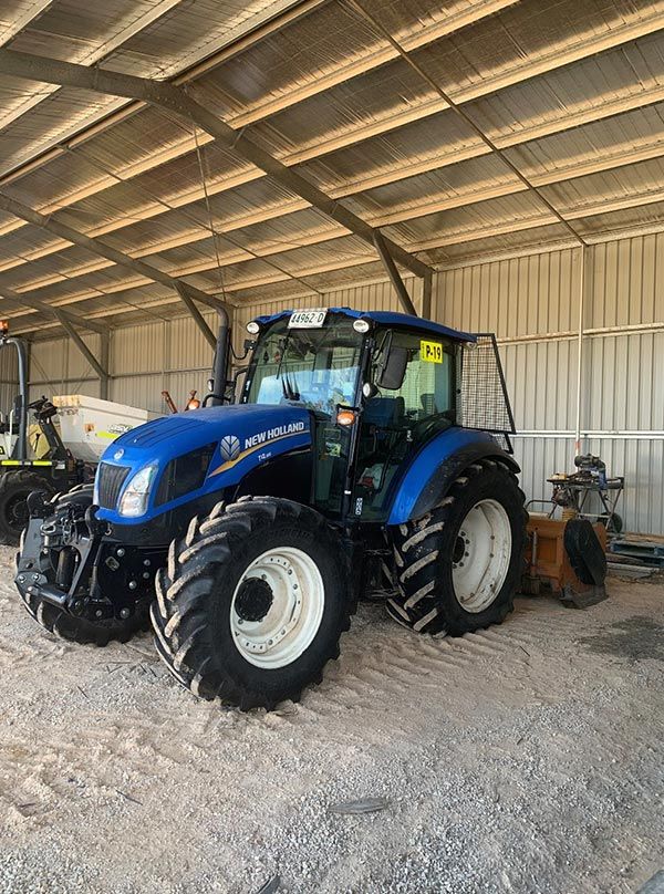 New Holland Tractor — Tree Services in Oberon, NSW