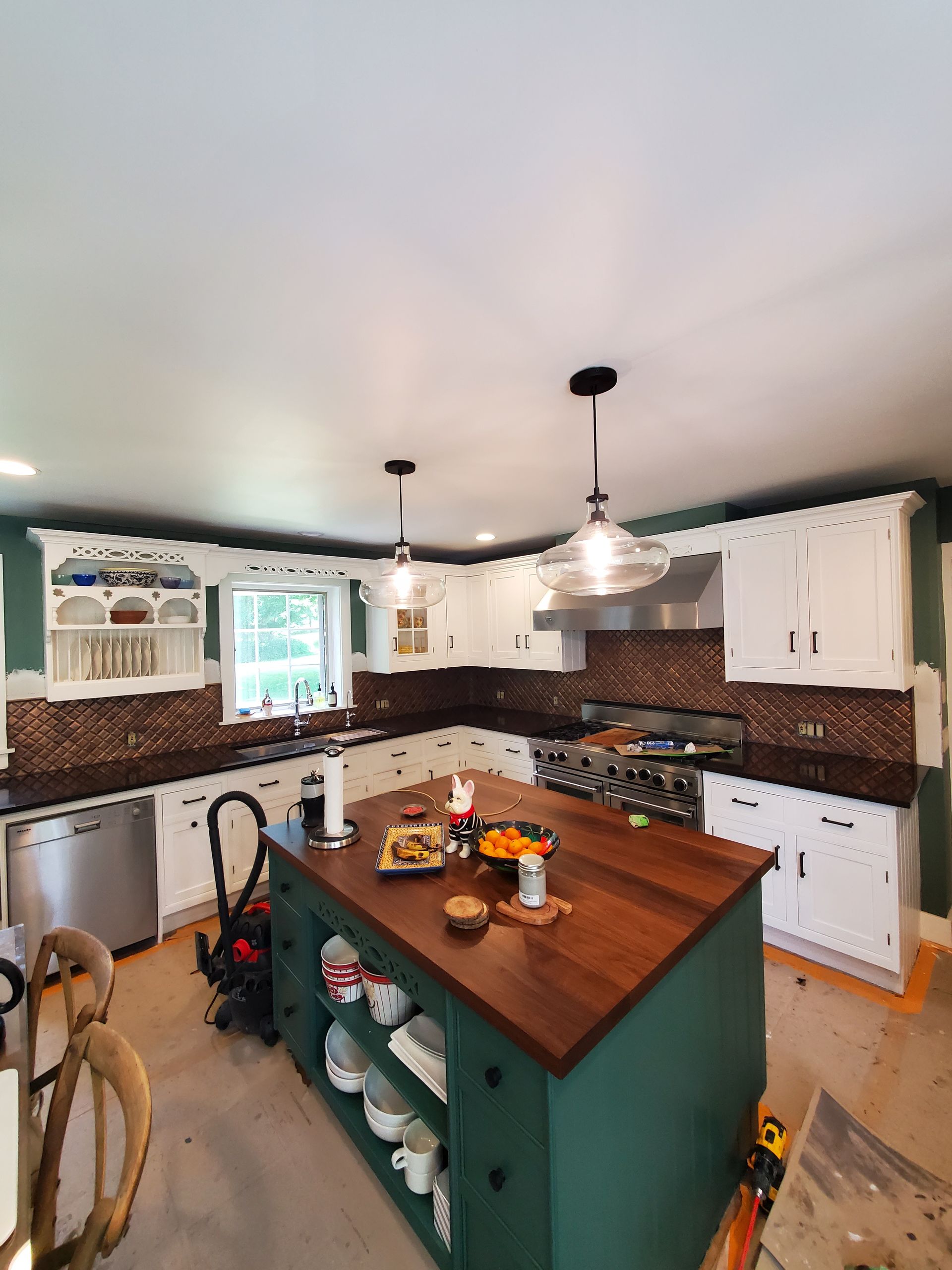A kitchen with a large island in the middle of it