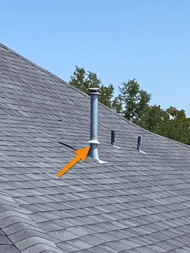 An arrow points to a chimney on the roof of a house