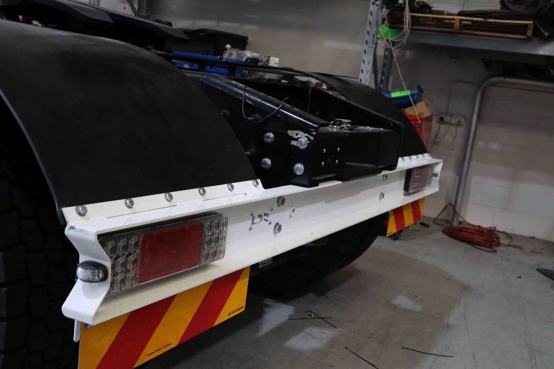 Kenworth truck, yard pulls, rear bumper installation, rubber mudguards, truck body accessories, truck accessories installation, light bars, custom trucks