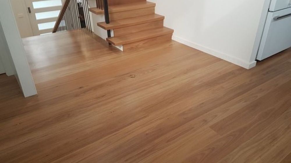 Wooden Floor with Wooden Staircase, White Walls — Express Timber Solutions In Long Jetty, NSW