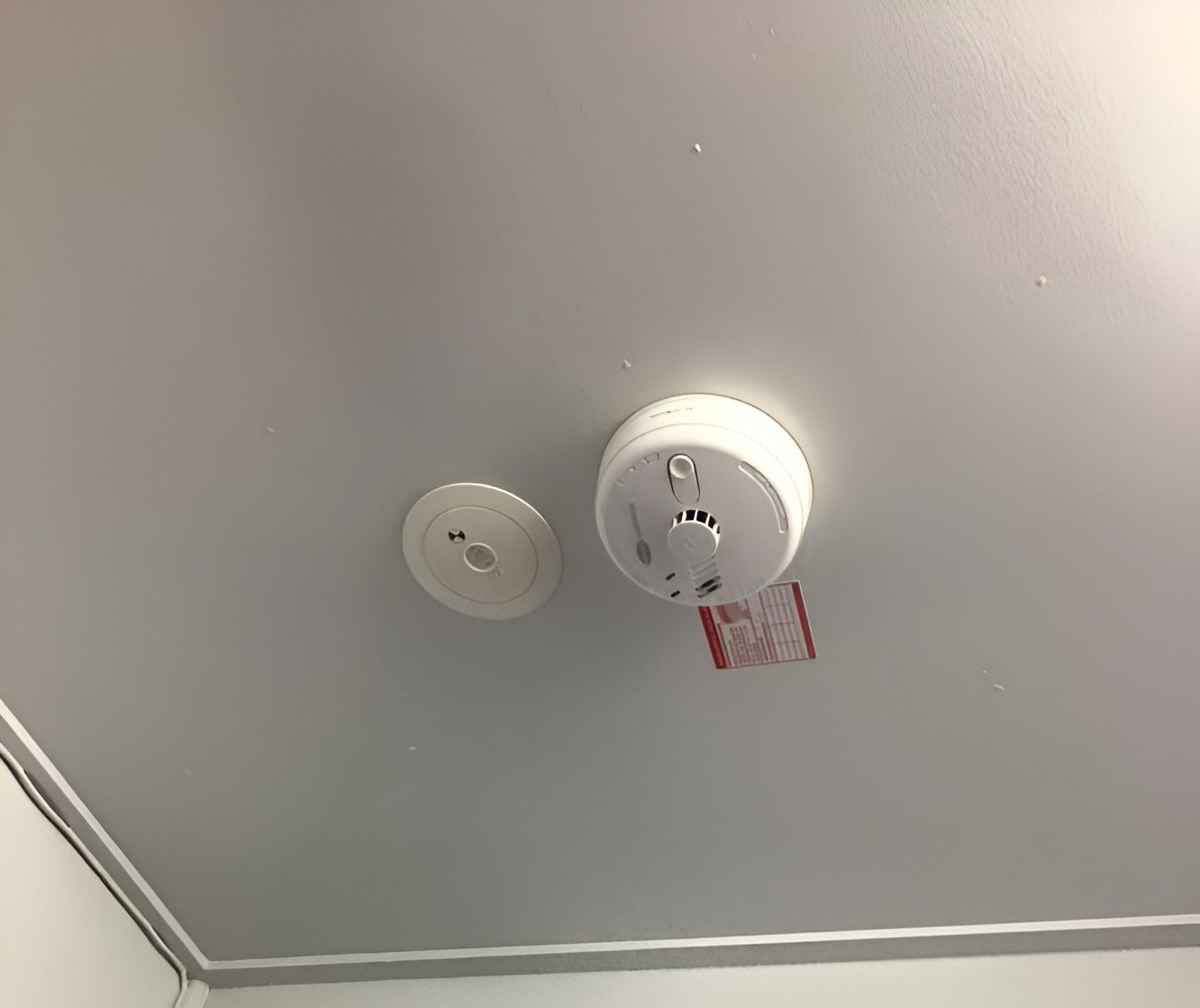Ceiling View With a Smoke Detector