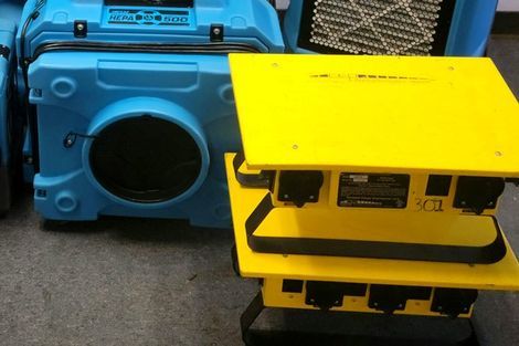A blue box and a yellow box are sitting next to each other