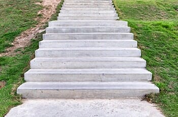 Concrete Stairs with Grass on Side — Cross Concrete Construction Inc in East Moline, IL