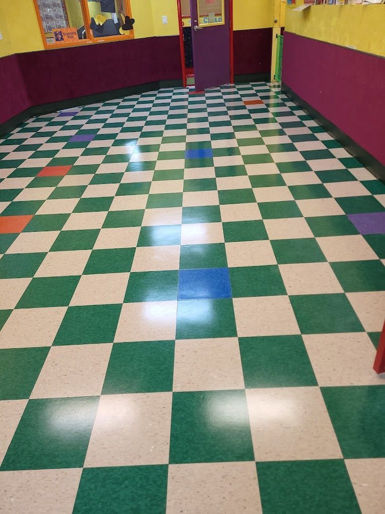 A room with a green and white checkered floor