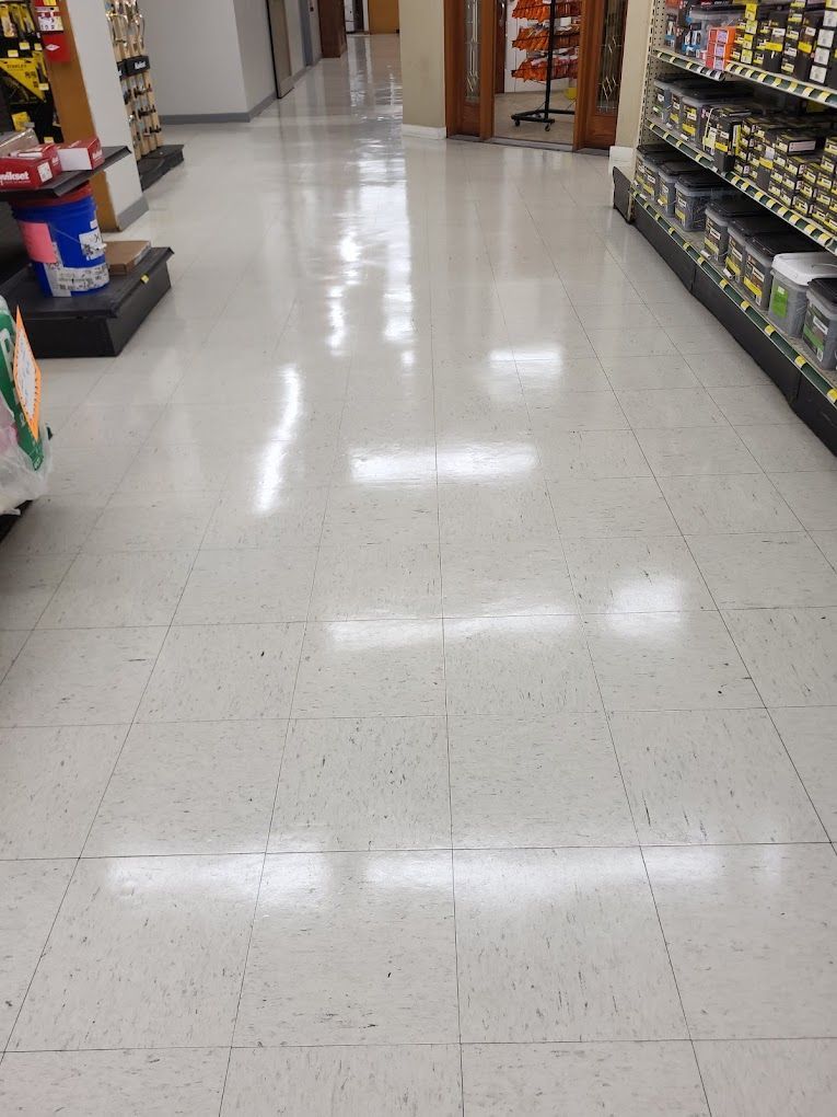 The floor of a store is shiny and clean