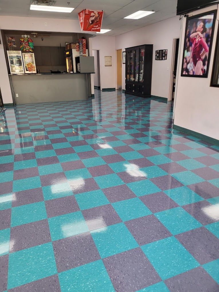 A large room with a blue and purple checkered floor.