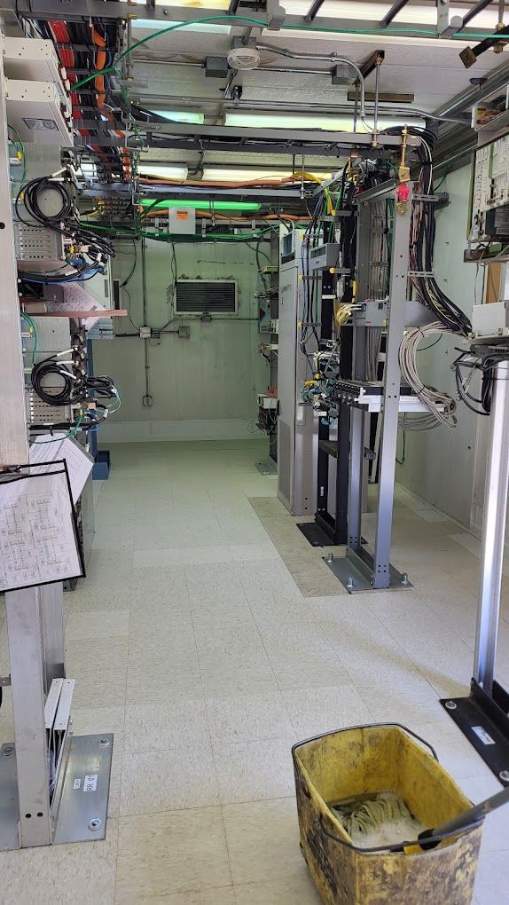 There is a yellow bucket in the middle of the room.