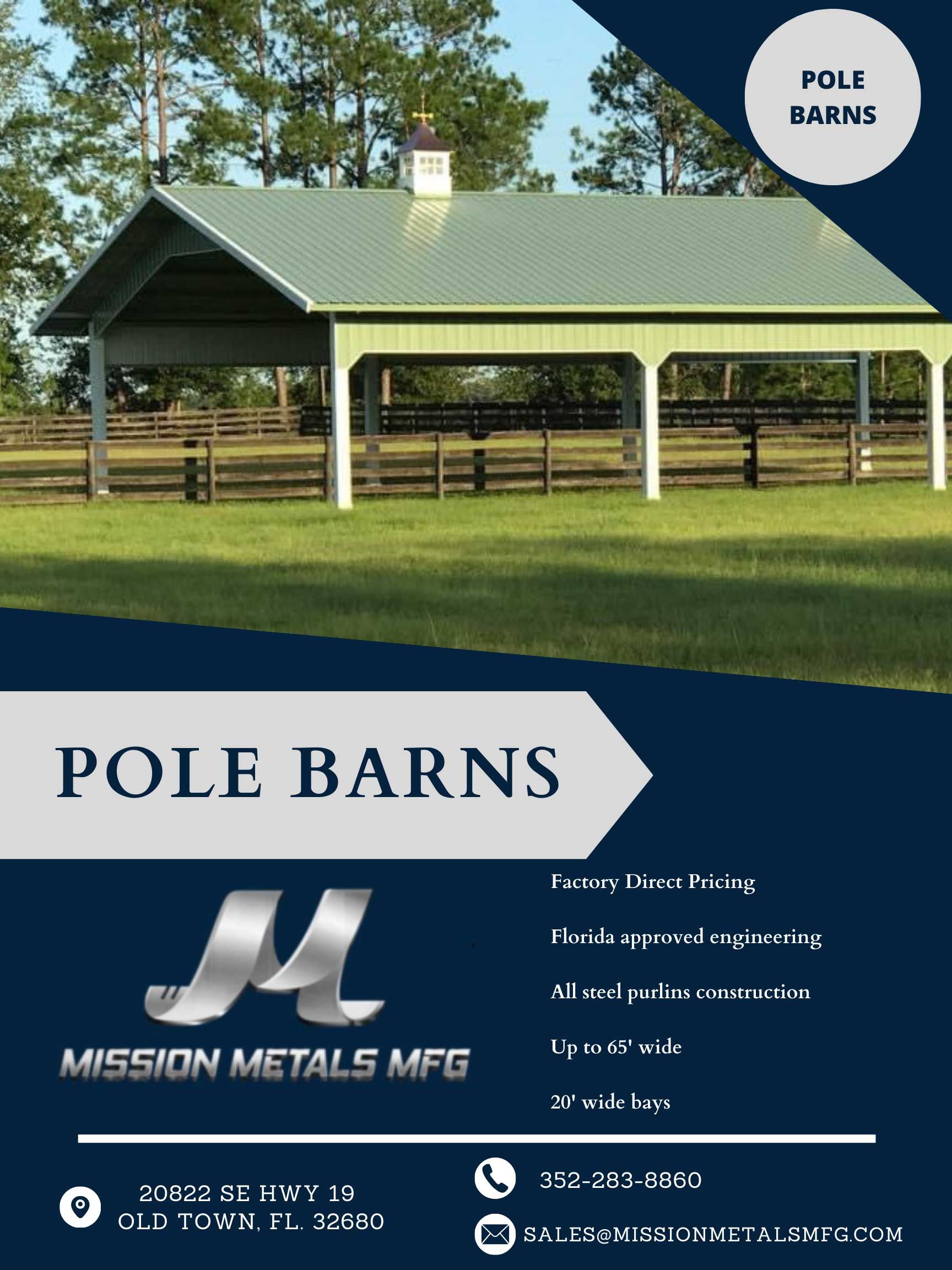 A pole barn is sitting on top of a lush green field.