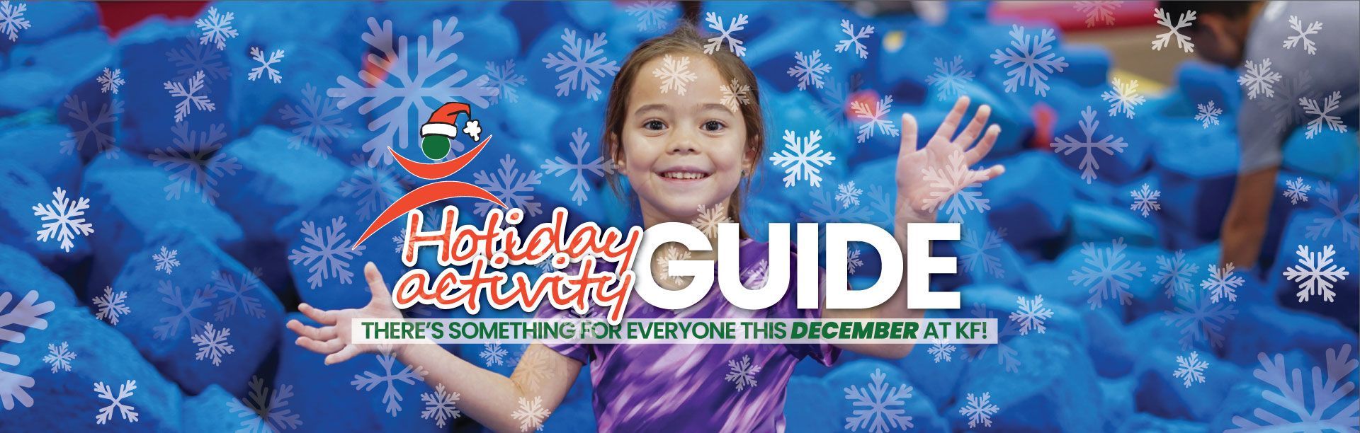 Girl smiling in a pile of blue blocks, with snowflakes and "Holiday GUIDE" text.