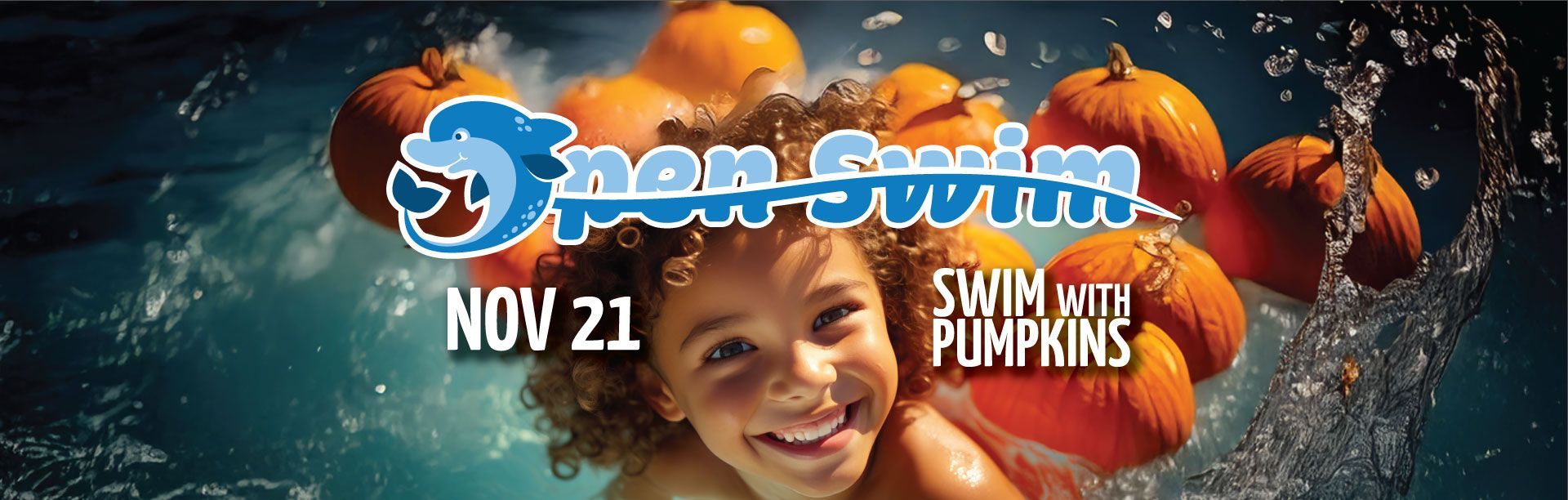 Child smiles in pool with pumpkins, swim event Nov 21.