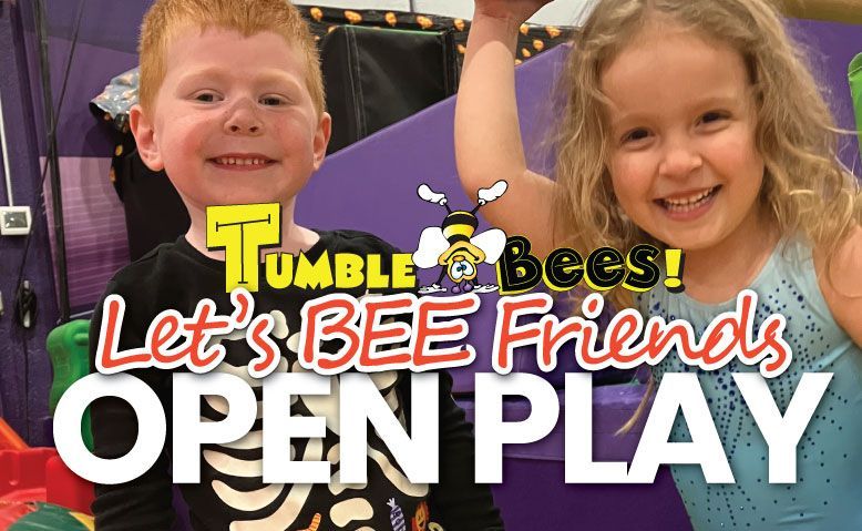 Two children smiling with arms raised behind a colorful “Let’s Bee Friends OPEN PLAY” sign