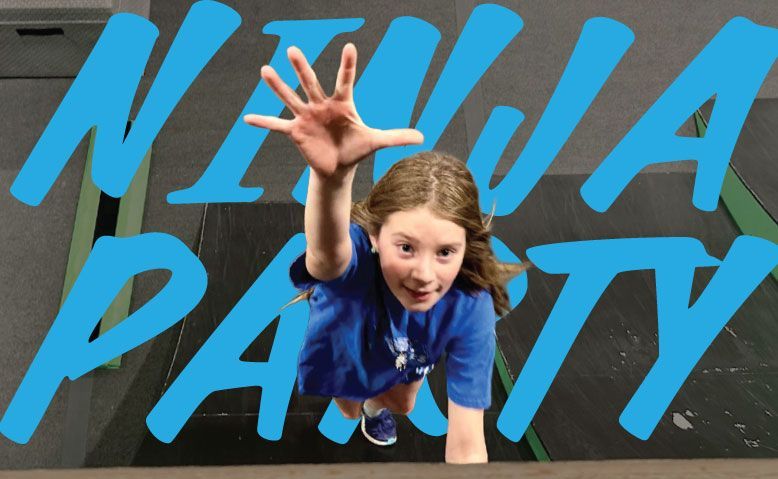 Girl reaching up in front of a bright blue “NINJA PARTY” mural