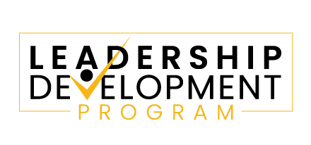 Logo for a Leadership Development Program in black and gold text and a checkmark.