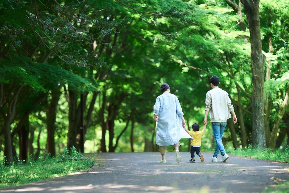A Person Is Writing On A Clipboard With A Pen — Noosa Psychological Services in Noosa Heads, QLD