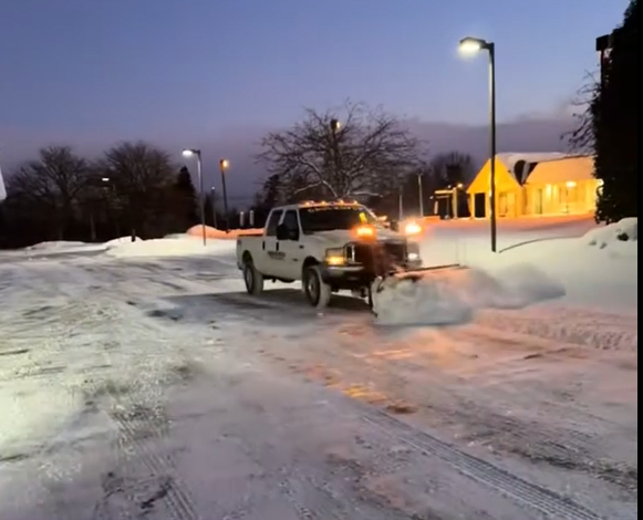 Plowing a Pepper Pike Parking Lot in the evening