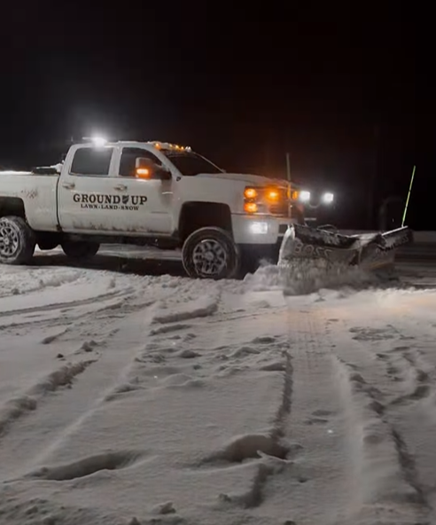 Plowing a parking lot at night in Chagrin Falls, Ohio