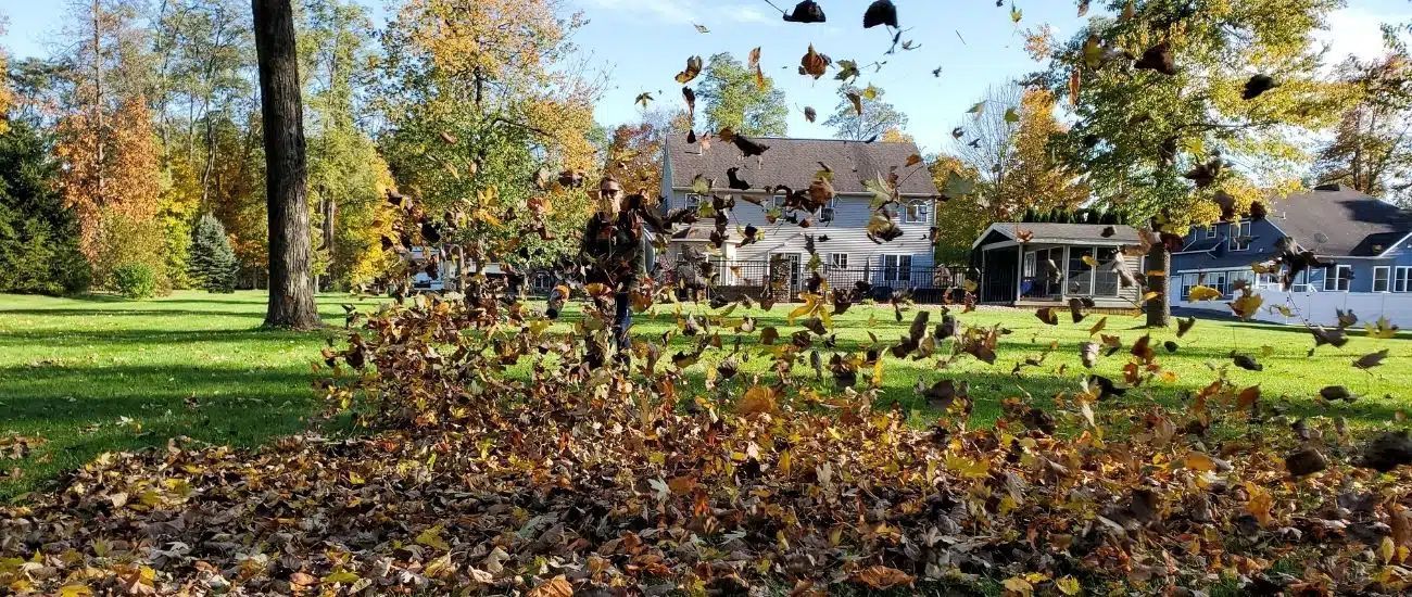 Blowing leaves off a Hudson, OH residential property