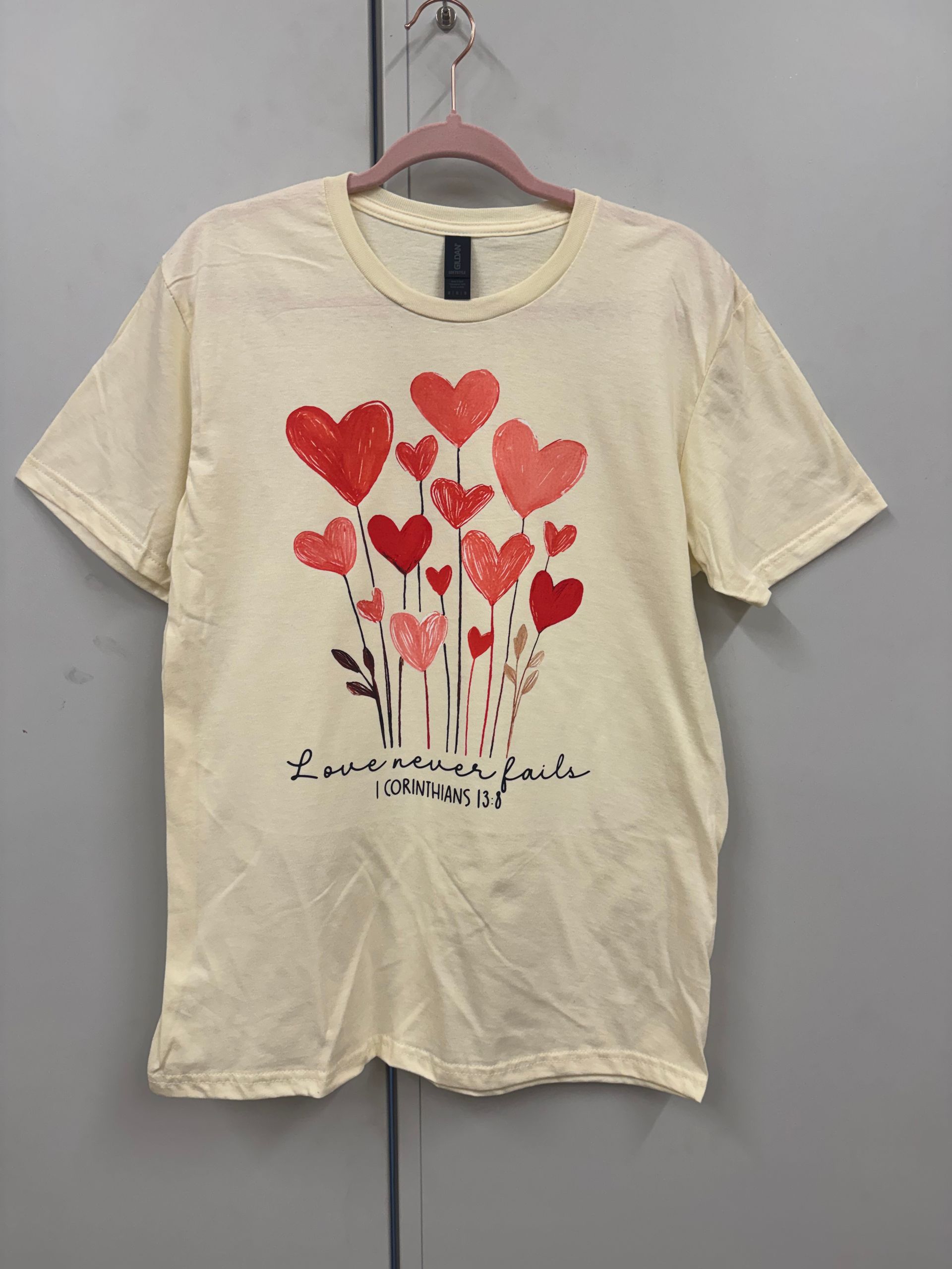 Love Never Fails Tee