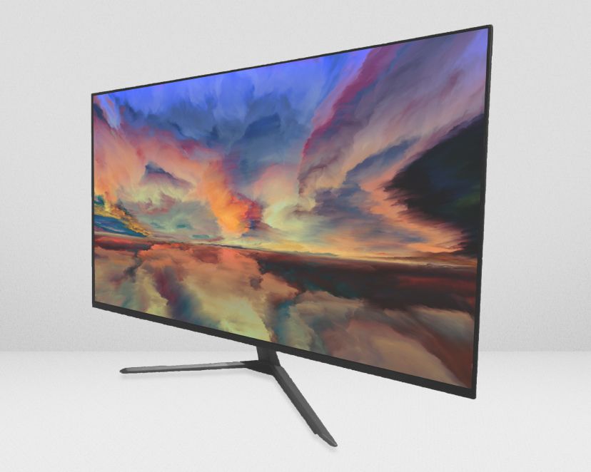 A computer monitor with a picture of a sunset on the screen