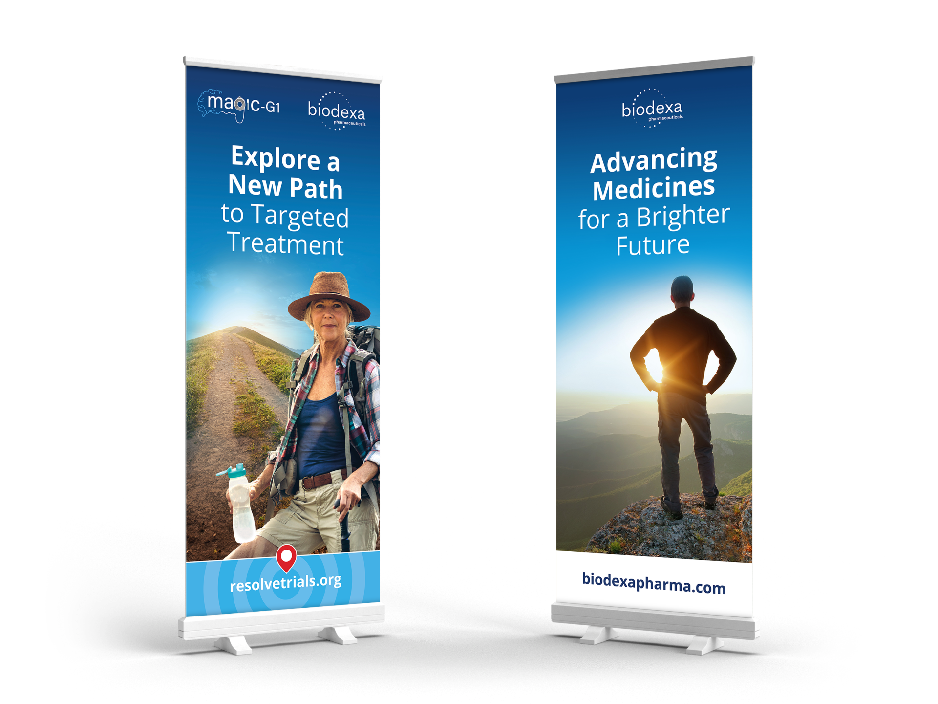 Two roll up banners with a man standing on top of a mountain.