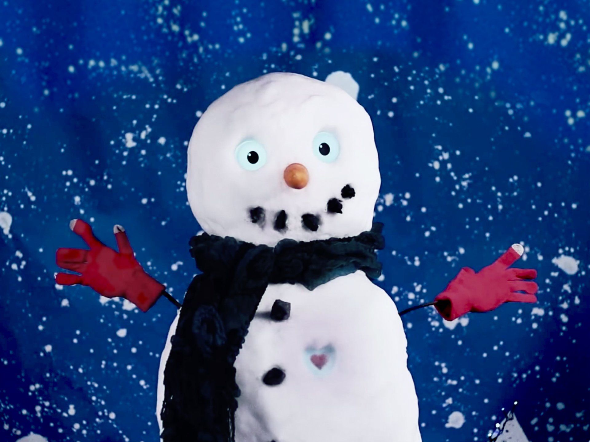 Christmas card video featuring a snowman and Samsung Galaxy smartphone. © The Animo Group Ltd.