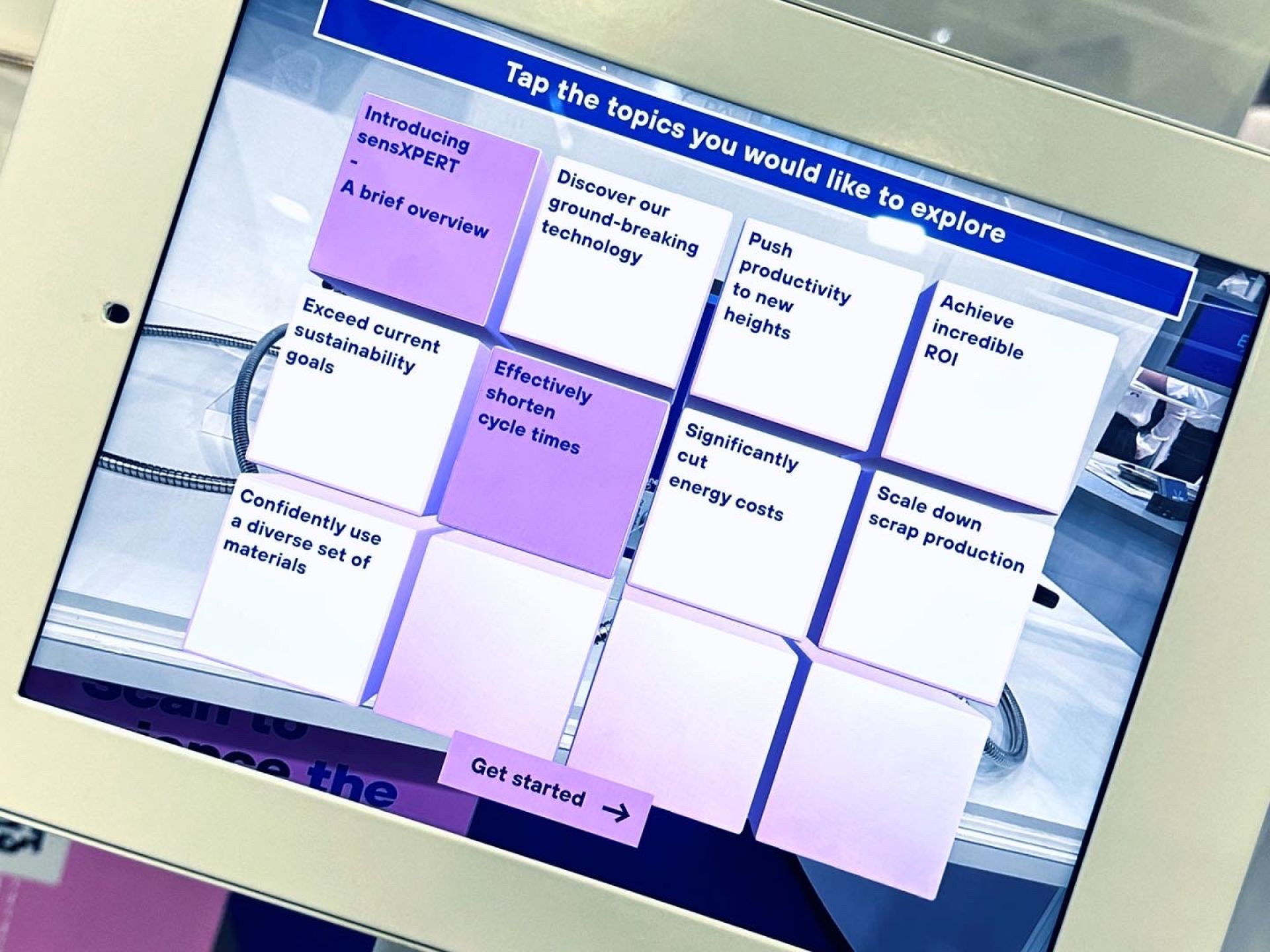 a tablet with an AR Experience on it that says tap the topics you would like to explore