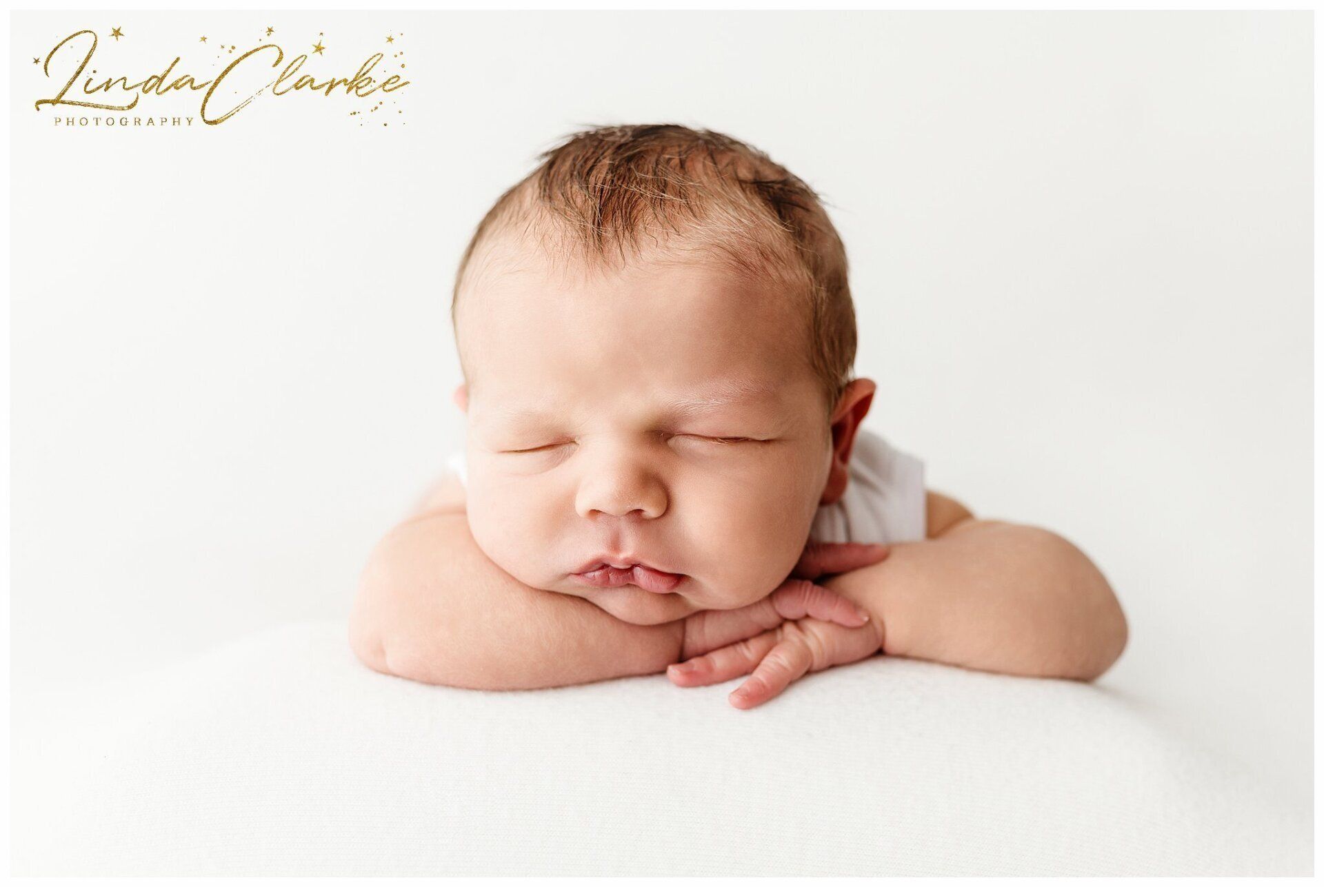 Newborn baby in cute posed photographs Kildare