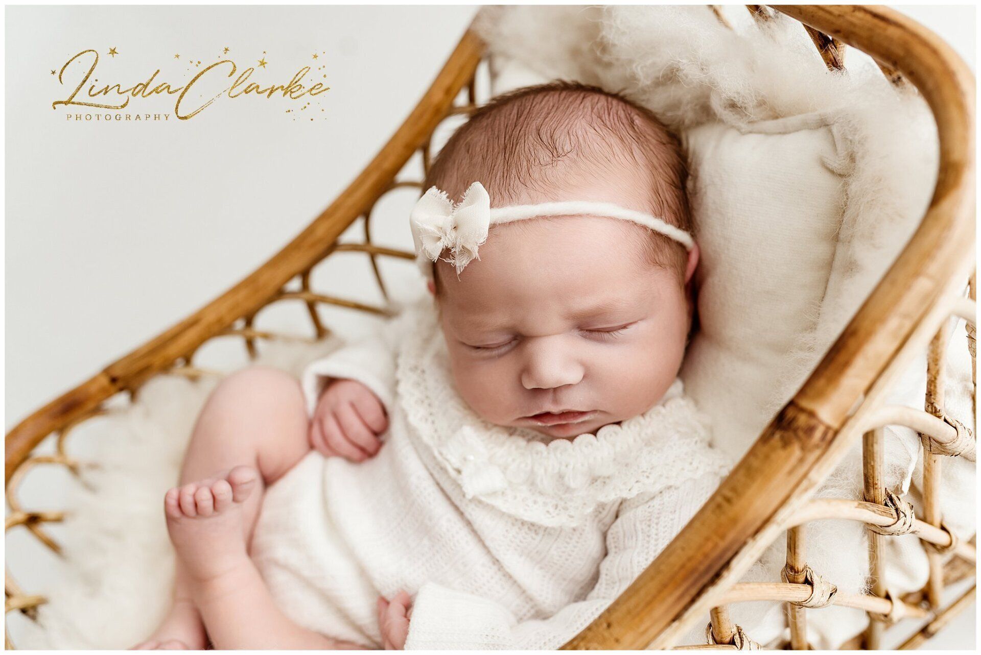 Newborn baby in cream outfit photographs Kildare