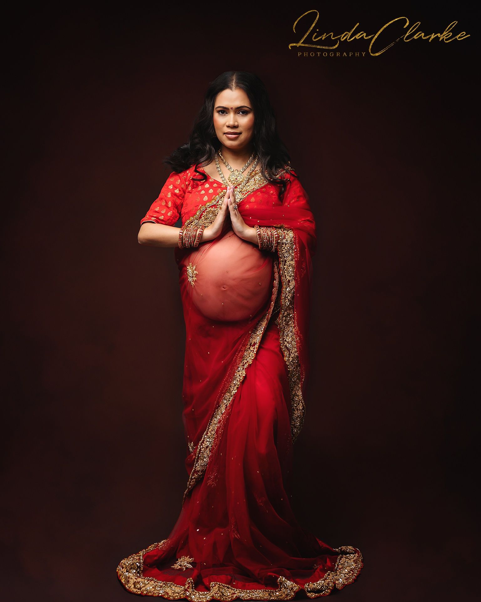 Pregnant lady wearing red dress