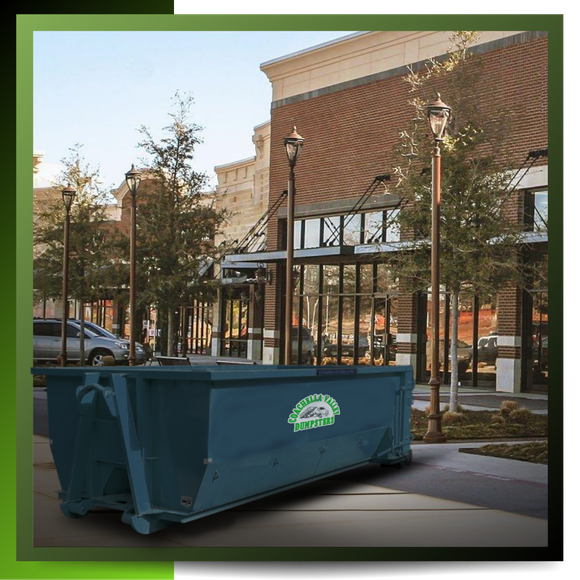 dumpster in front of a house