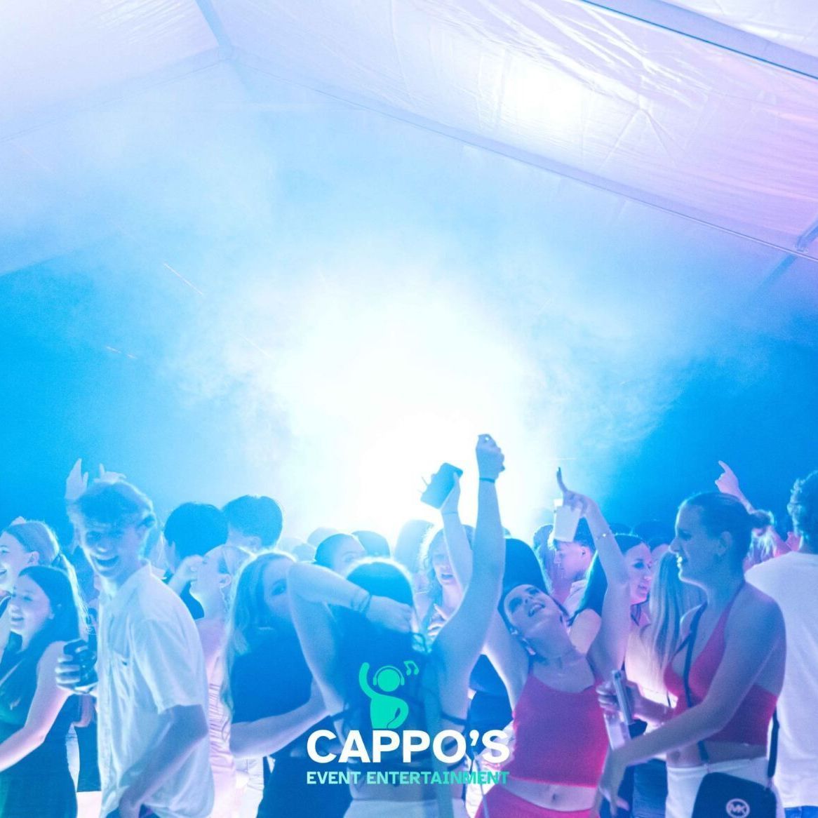 A group of people are dancing in a club called cappo 's