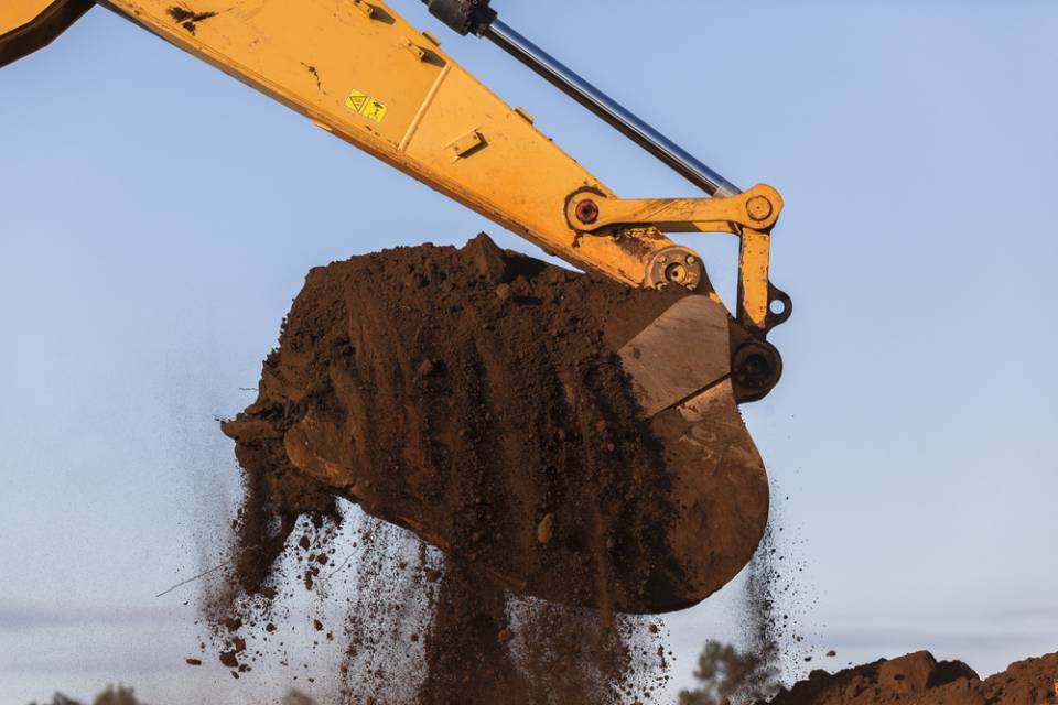 machine excavating soil