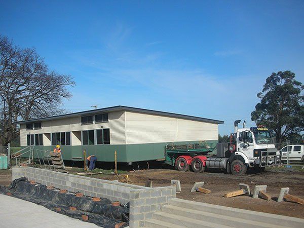 large building on truck