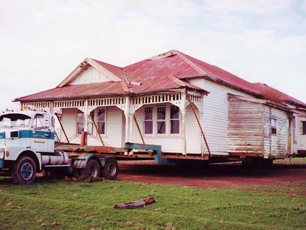large vintage home on truck bed