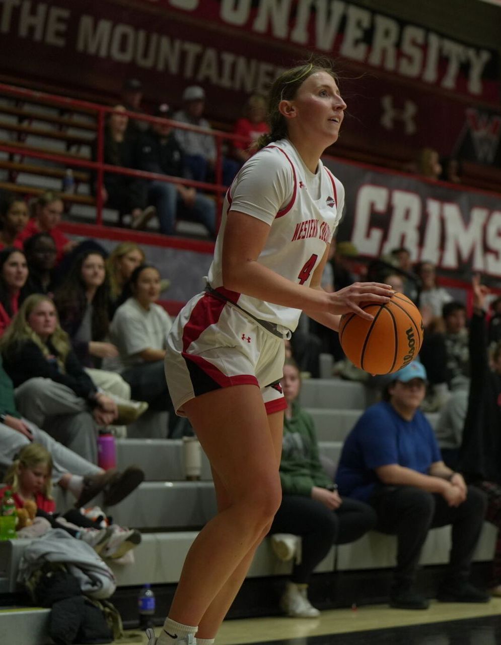 A female basketball player with the number 1 on her jersey
