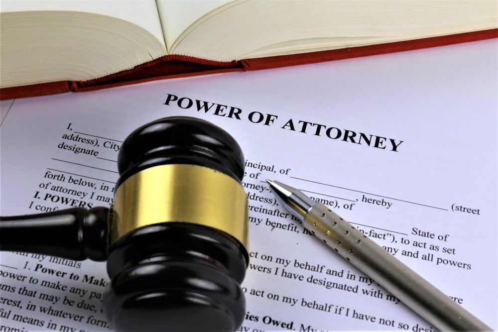 A Gavel Is Sitting On Top Of A Power Of Attorney — SJP Law In Maroochydore, QLD