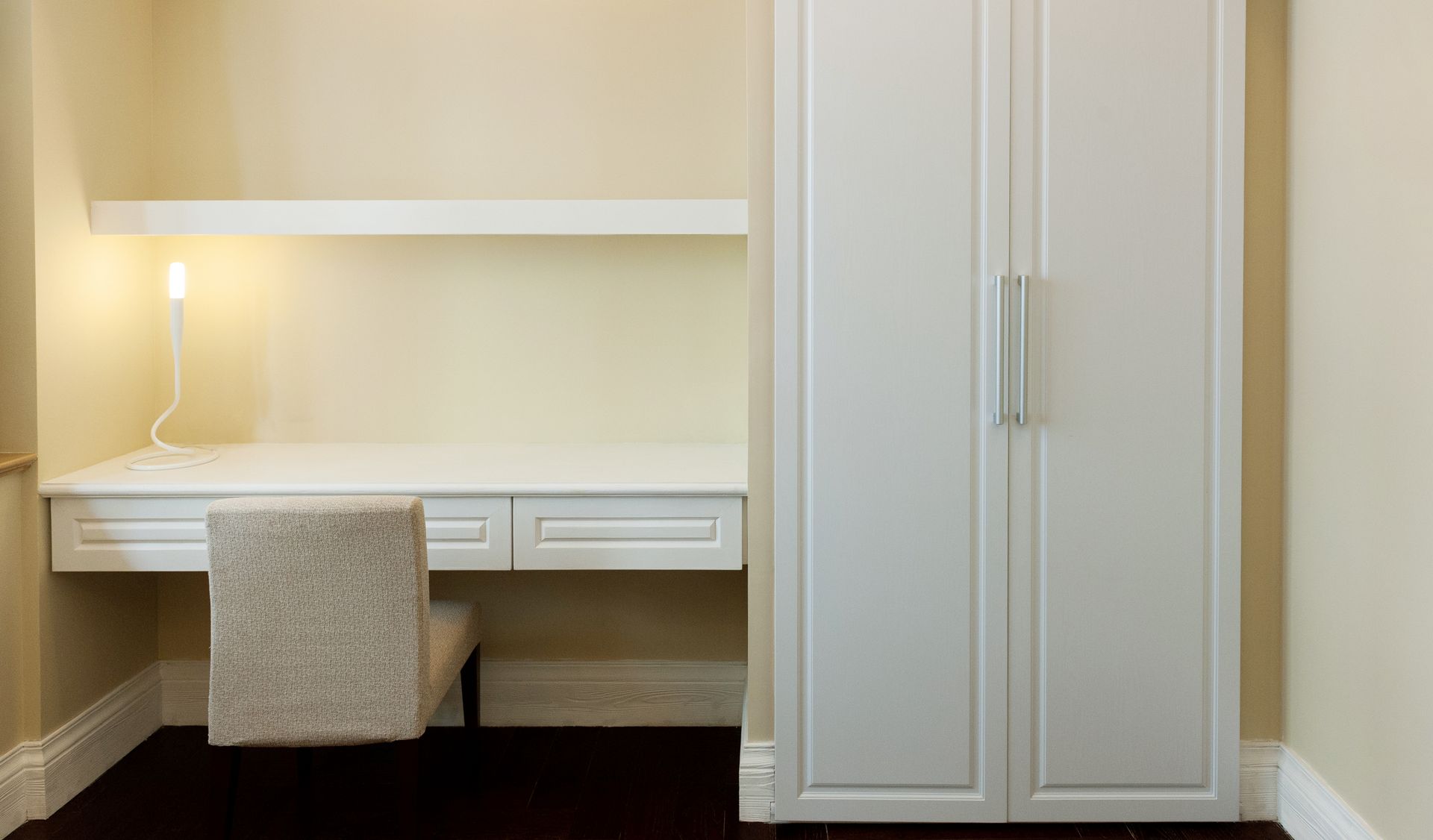 Custom bedroom shelving and a desk designed for your space and style.