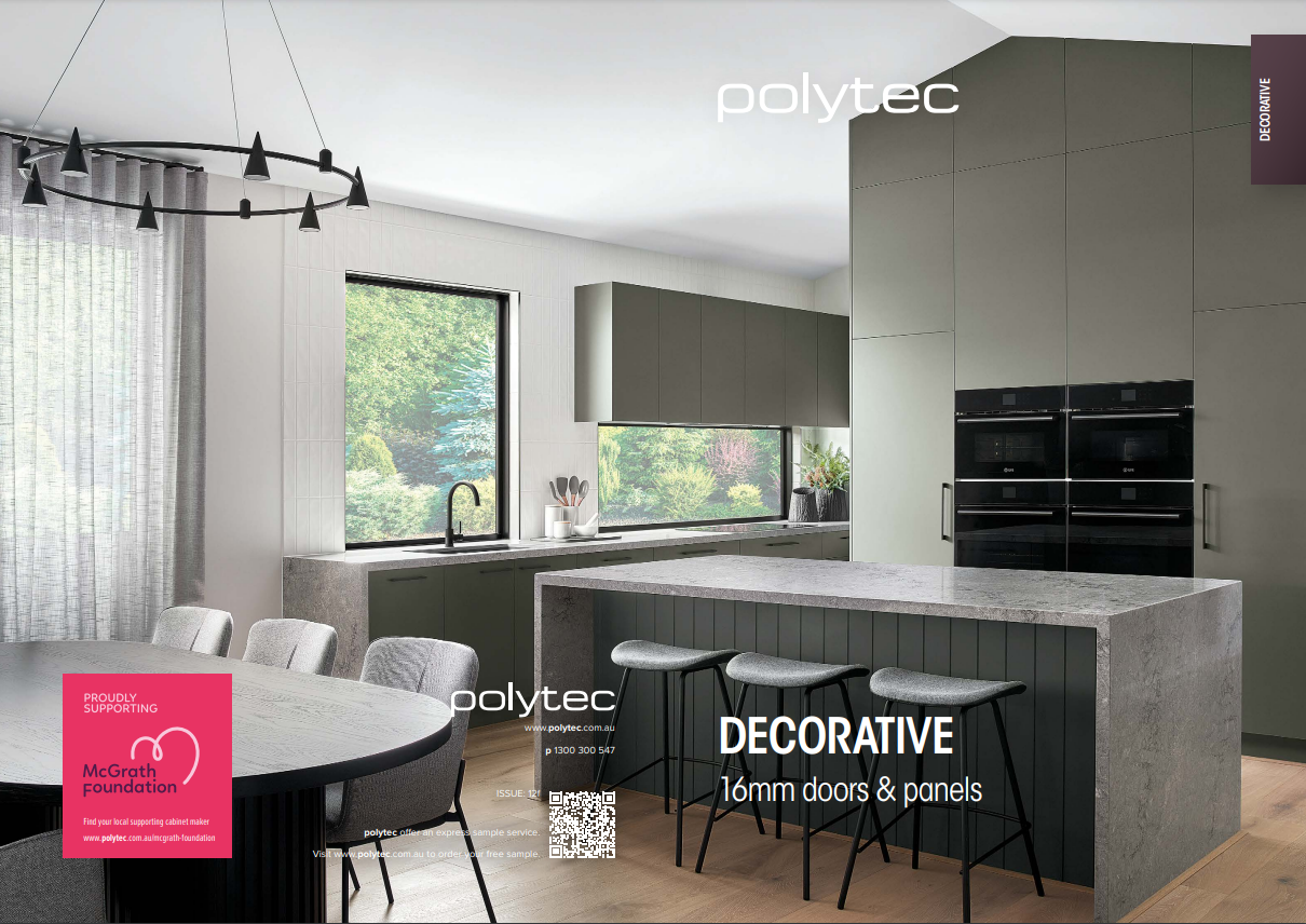 A walk in closet with clothes hanging on shelves and a bathroom