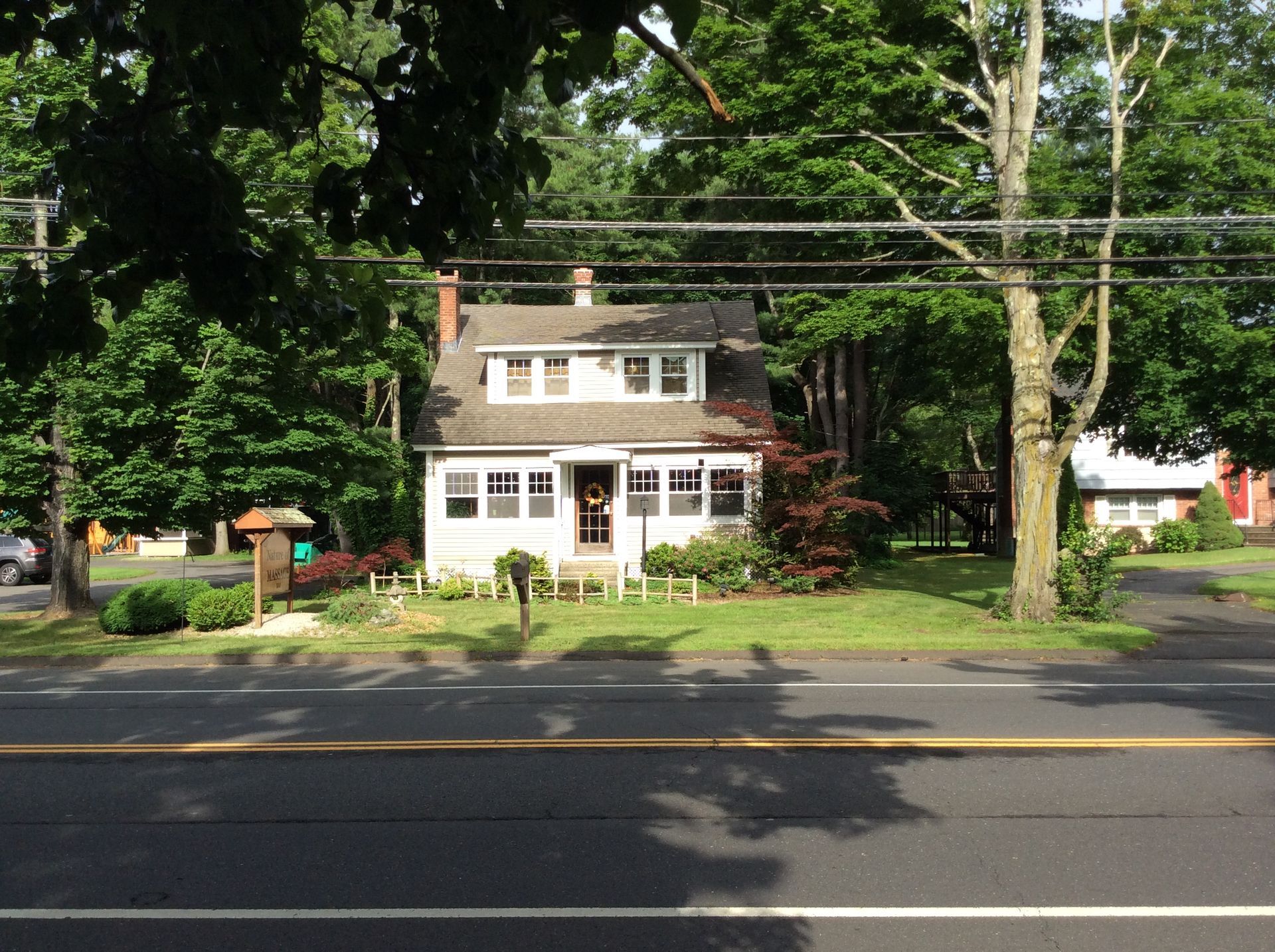 A house with a sign that says open on it