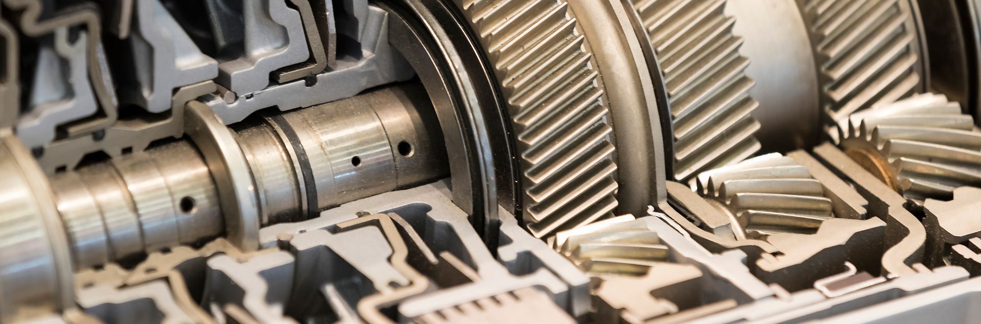 A close up of a gearbox with a lot of gears.