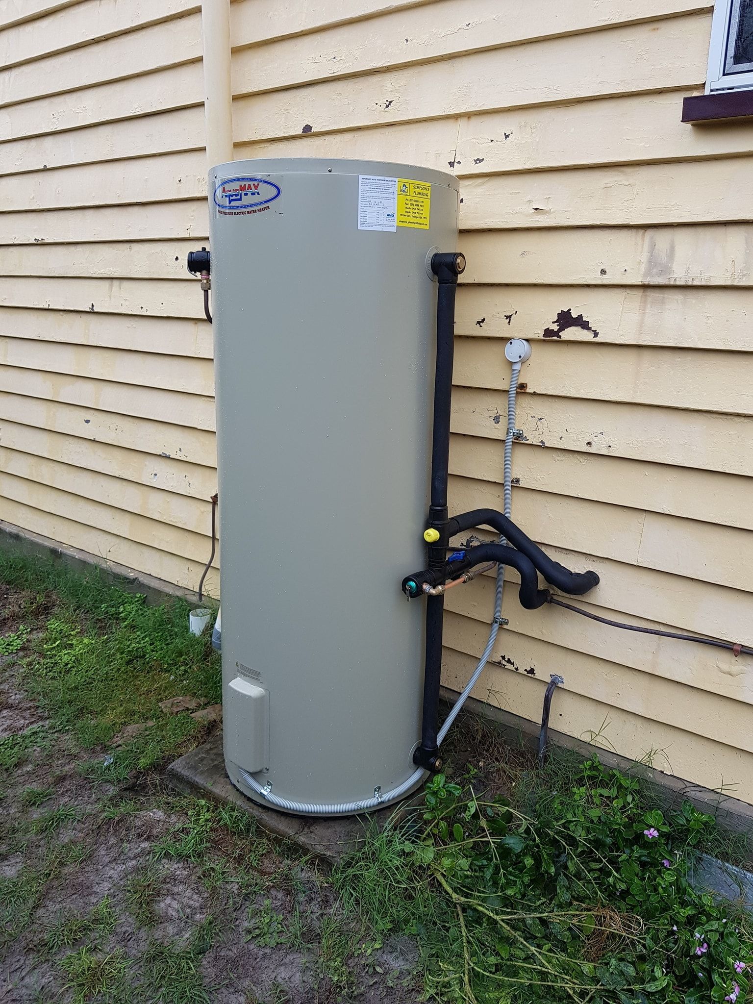 A Person is Using a Plunger to Unblock a Sink — Simpson's Plumbing & Maintenance Service in Deception Bay, QLD