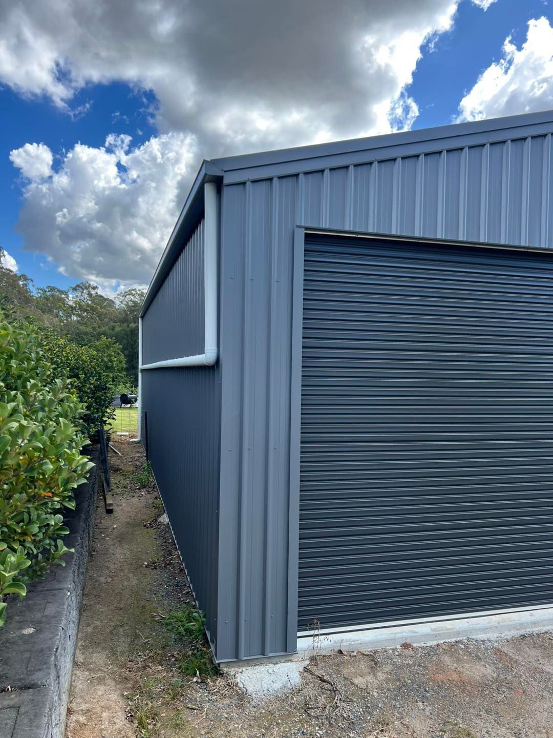 A blue metal building — Simpson's Plumbing & Maintenance Service in Dakabin, QLD