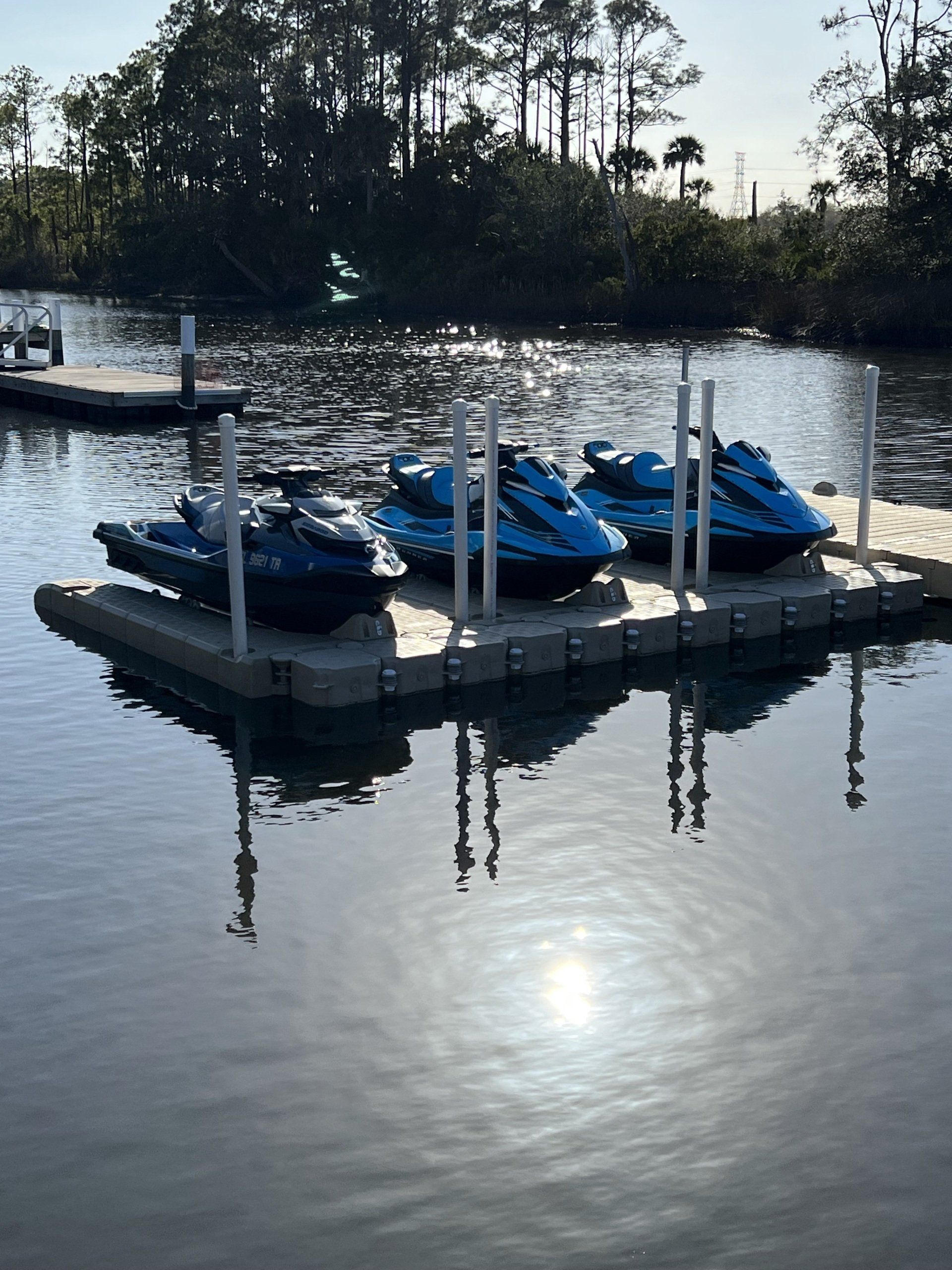 Three Jet Ski on a Calm Blue Sea — Jacksonville, FL — Serenity Brothers Inc