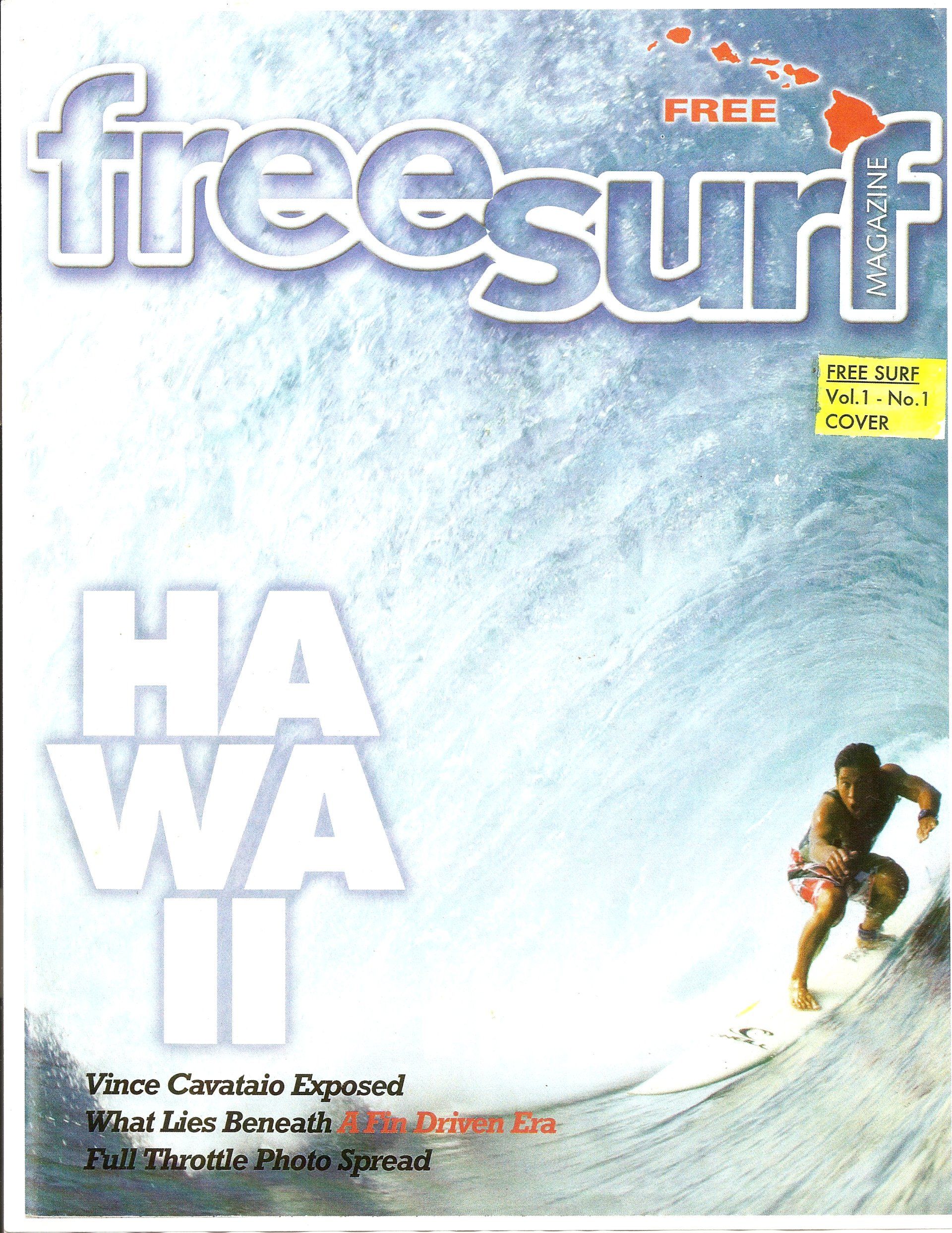 A freesurf magazine cover with a man riding a wave