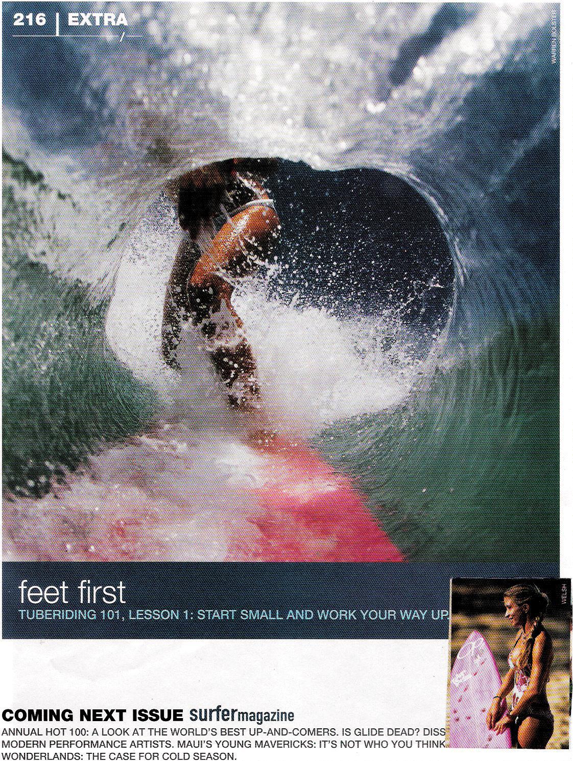 A woman is riding a wave on a surfboard in the ocean.